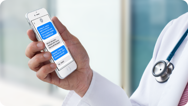 mockup-of-a-doctor-s-hand-holding-an-iphone-12438 2